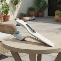 Ardor™ Reflex Pro handheld device, white with oval shape and teal accents