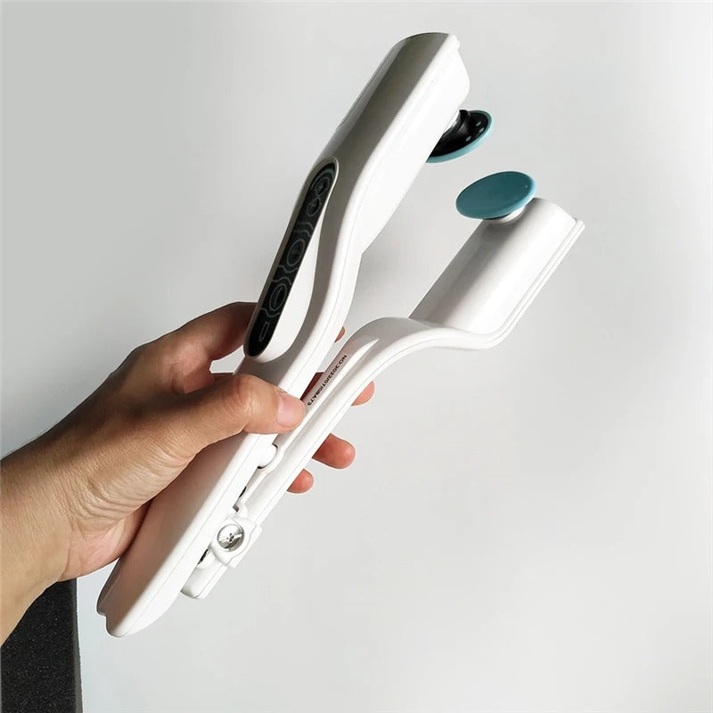 White reflex stimulator with blue pad heads and side clasp detail